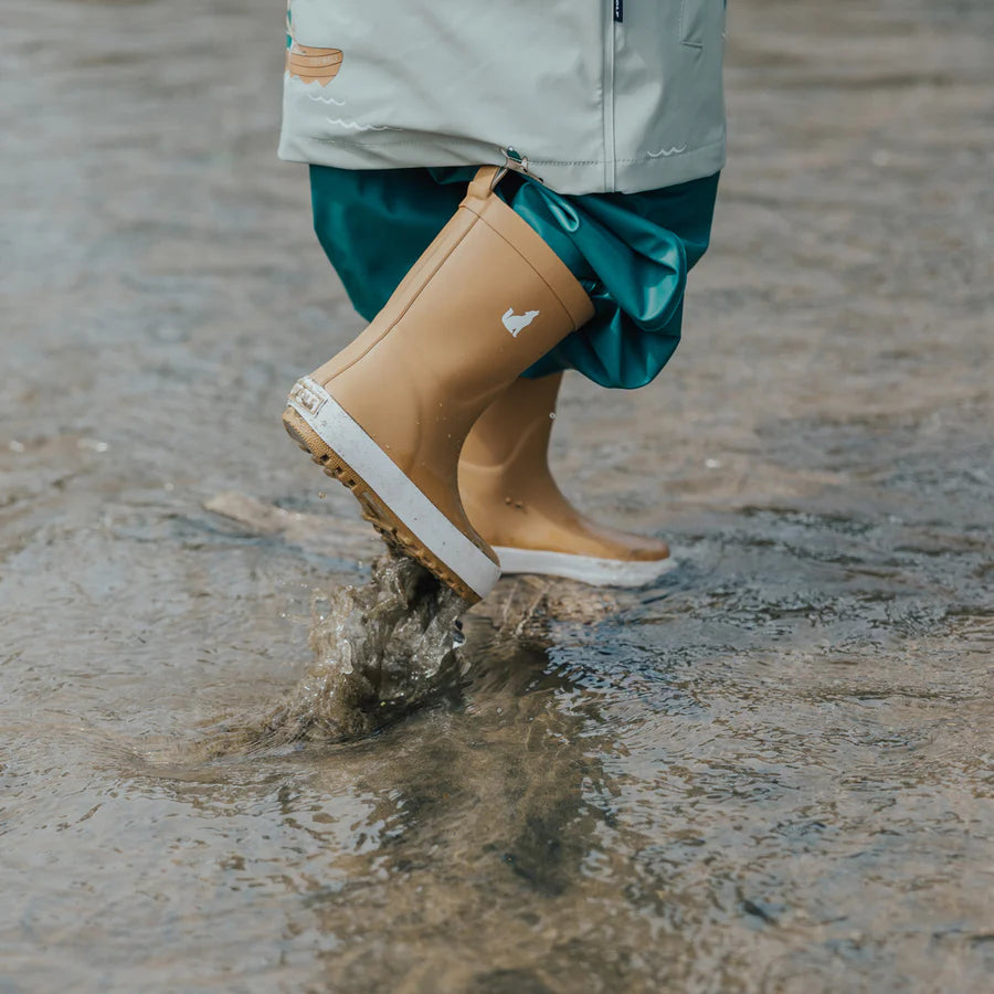 Crywolf Rain Boots Tan in rain.