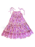 Pink floral dress with tiered skirt in a Lilac haze print, a vibrant shades of magenta, pink, and cream.