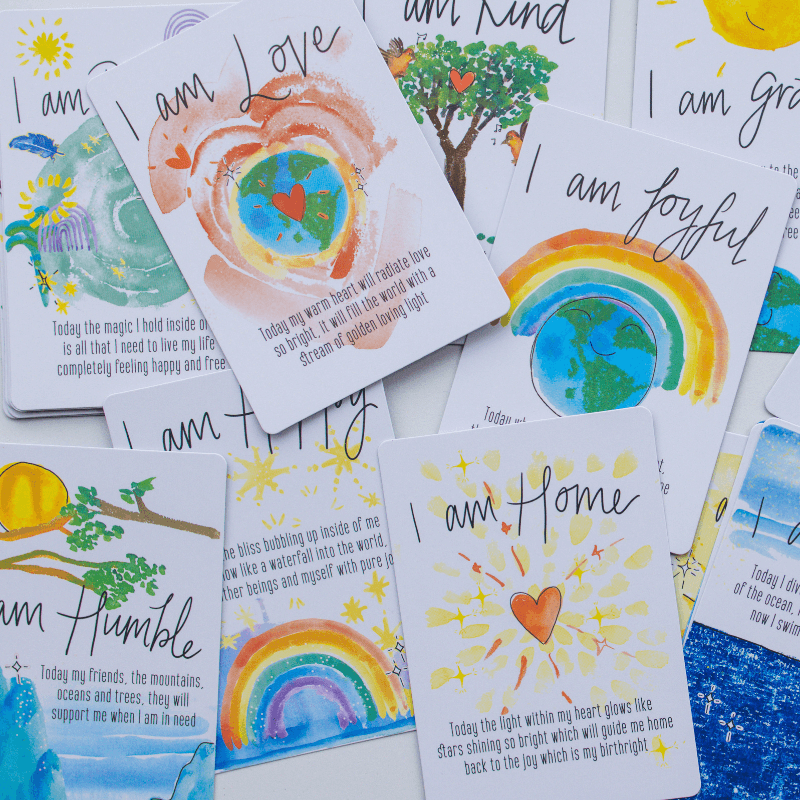 Motivational affirmation cards with colorful designs and text on a white background